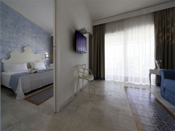 Sommige hotelkamers beschikken over 4 slaapplaatsen - Gezinsvakantie Sardinie
